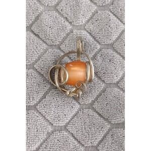 Silver And Orange Gem Pendant Wrapped In Silver Swirls Unmarked & Unbranded‎